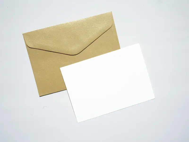 An envelope and a blank invitation card