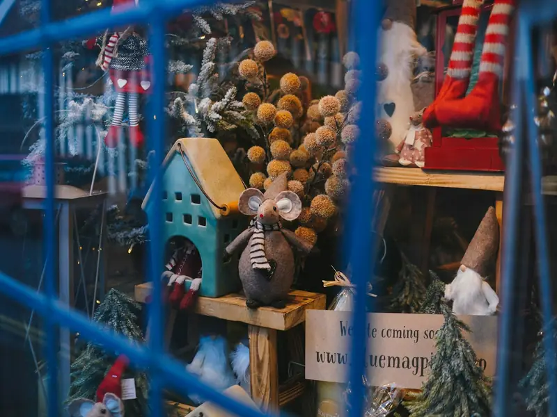 A toy shop window full of colourful displays