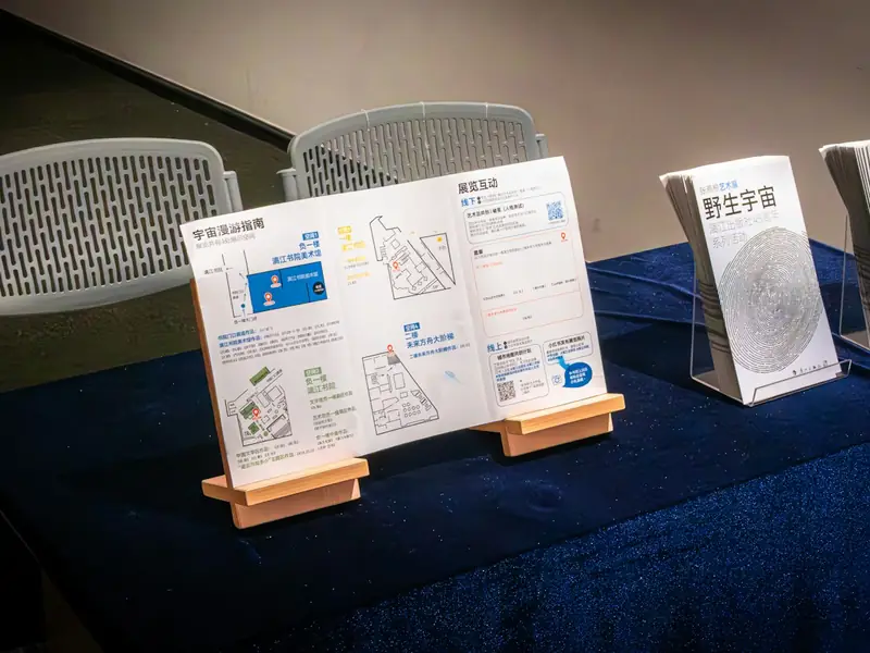 Brochures on the table of an exhibition stand