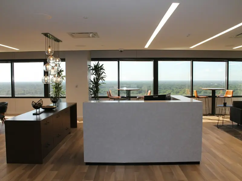 The reception desk of a bright office